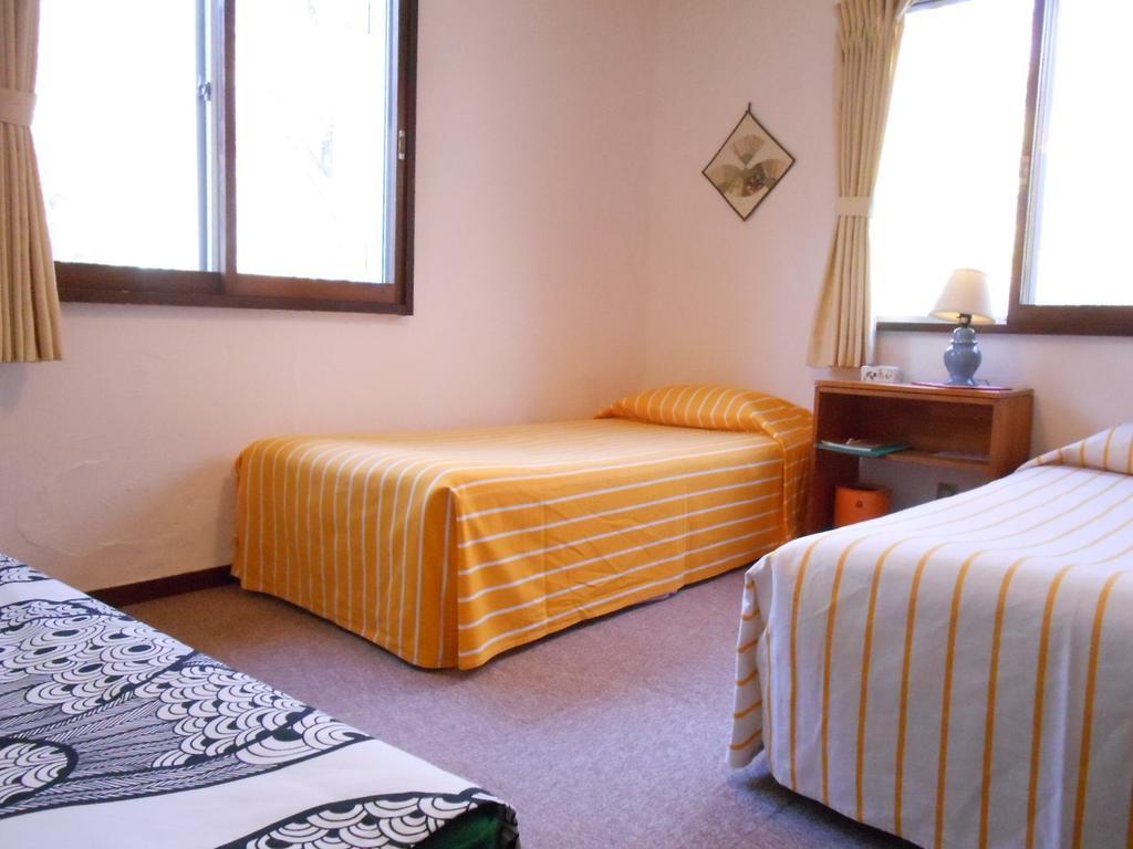 Pension Nugget Inn Hakuba Kamer foto