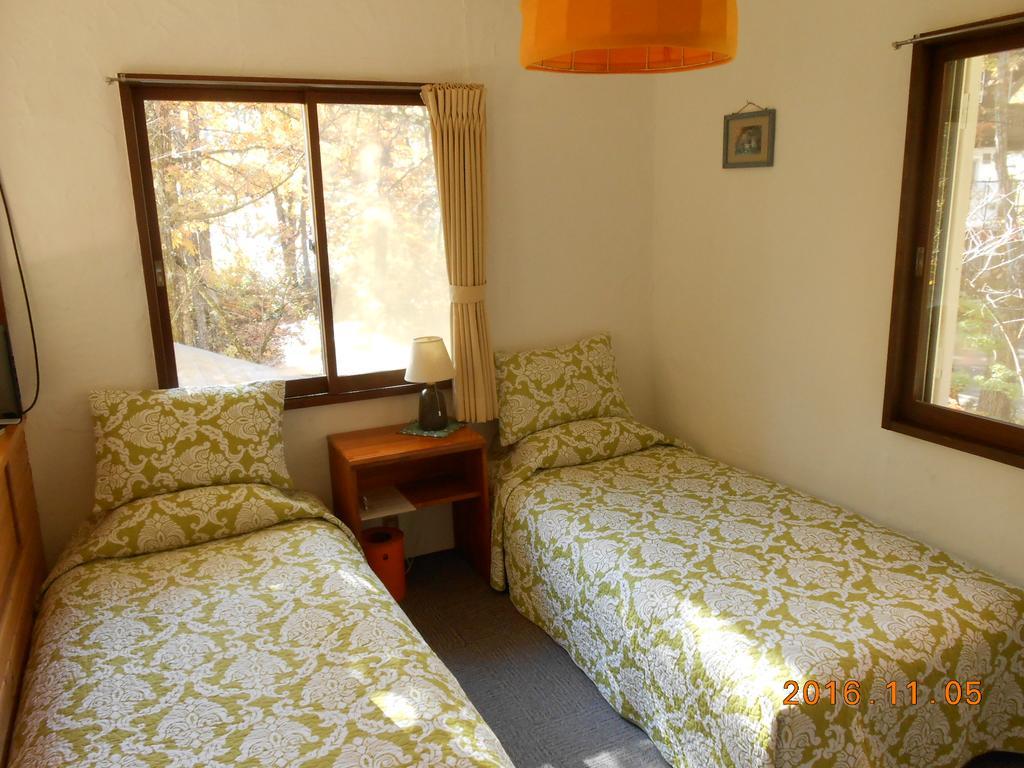Pension Nugget Inn Hakuba Buitenkant foto